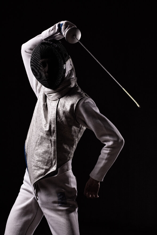 Portrait Male Fencer Mask Foil Performing Fight